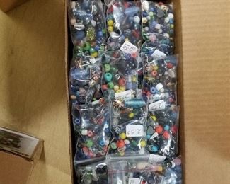 assorted glass beads approximately 60 bags