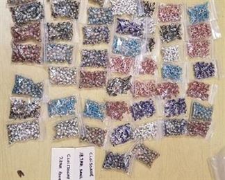 Approx 51 packages of Cloisonne Beads- Round and Small Crosses