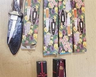 4 boot knife hunting knives and 2 Superior multi-purpose knives