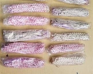 12 bags of assorted stranded beads