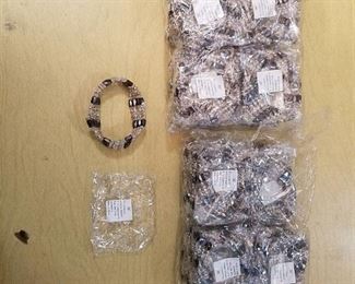 approximately 48 magnetic beaded strands - 36 in