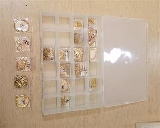 organizer container with assorted gold necklaces