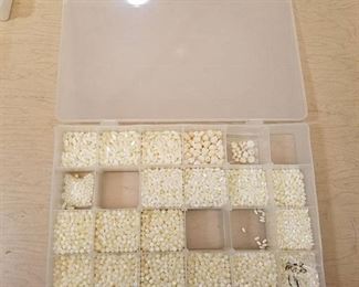 organizer Container full of mother of pearl jewelry beads