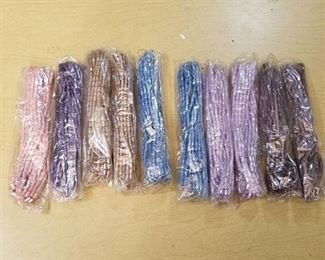 assorted beaded strands - various colors- approx 10 strands per bag