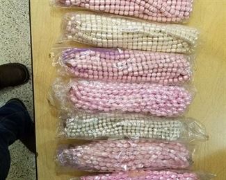 7 bags of beaded strands - assorted colors and shapes and sizes