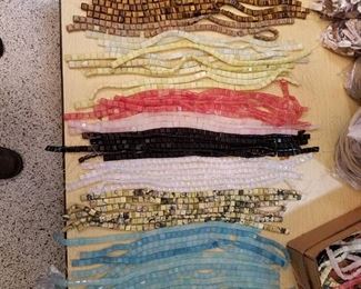 approximately 50 beaded strands - assorted colors