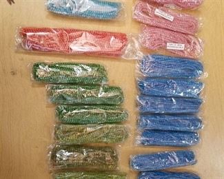 approximately 18 packages of beaded strands - 16 in- assorted colors
