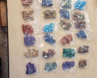 approximately 29 bags of beads - 2 holes in beads