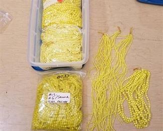 large lot of number 6 light yellow and number 13 pale yellow beaded strands