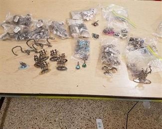 large lot of assorted figurines - dragons, skeletons, Wizards, horses, Etc.