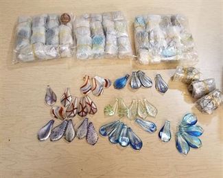 approximately 190 glass jewelry pendants