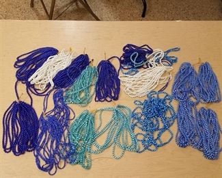large lot of assorted beaded strands - various colors and sizes