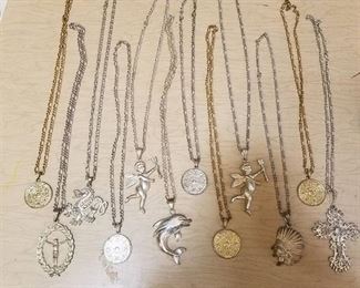12 assorted necklaces with pendants
