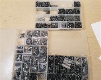 3 organizer containers of assorted jewelry beads