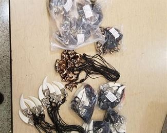approximately 100 necklaces - Eagles and Dragons