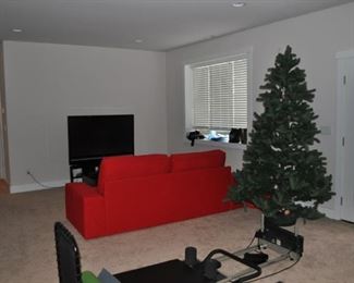 7.5' Christmas tree, Ikea red sofa, Samsung television