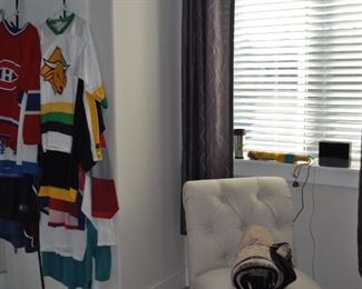Hockey jerseys, side chair, blankets