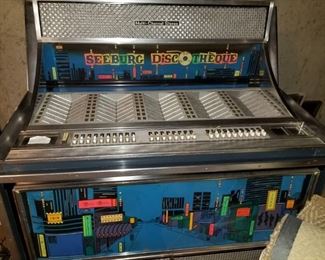 Seeburg Jukebox, full of records, needs repair work due to lack of use . 