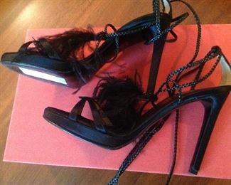 VALENTINO GARAVANI BLACK FEATHERS, SATIN, LEATHER LACE-UP OPEN-TOE SHOES: Size 36.5. Heel height: 4 ¼ inch satin heel. Long leather braided ties for versatile wear. Condition: Very good. Retail Value: $1,345. Price: $200.