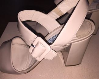 PRADA VERNICE CIPRIA NUDE BLOCK HEEL OPEN-TOE SANDAL: Size 37. Heel Height: 3 inches. From 2019 summer collection. Made in Italy. Condition: Scratches, scuffs, knicks and wear throughout. Retail Value: $600. Price: $100.