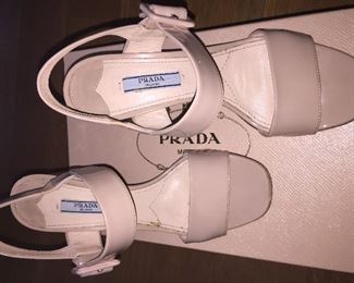 PRADA VERNICE CIPRIA NUDE BLOCK HEEL OPEN-TOE SANDAL: Size 37. Heel Height: 3 inches. From 2019 summer collection. Made in Italy. Condition: Scratches, scuffs, knicks and wear throughout. Retail Value: $600. Price: $100.