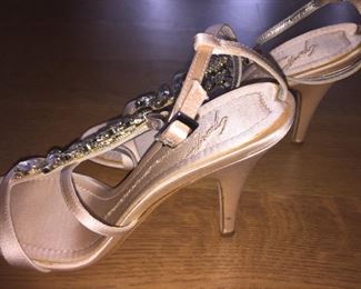 GIUSEPPE ZANOTTI SOFT PINK JEWEL EMBELLISHED SATIN STRAPPY EVENING SANDAL: Size 37.5 inches. Heel height: 4 inches. Made in Italy. Condition: Very good. Marks on both heels. Retail Value: $2,125. Price: $300.