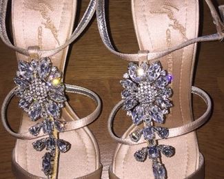 GIUSEPPE ZANOTTI SOFT PINK JEWEL EMBELLISHED SATIN STRAPPY EVENING SANDAL: Size 37.5 inches. Heel height: 4 inches. Made in Italy. Condition: Very good. Marks on both heels. Retail Value: $2,125. Price: $300.