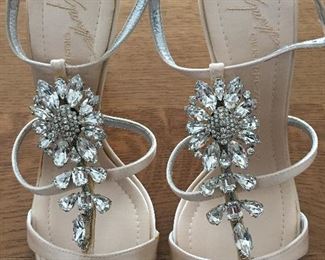GIUSEPPE ZANOTTI SOFT PINK JEWEL EMBELLISHED SATIN STRAPPY EVENING SANDAL: Size 37.5 inches. Heel height: 4 inches. Made in Italy. Condition: Very good. Marks on both heels. Retail Value: $2,125. Price: $300.