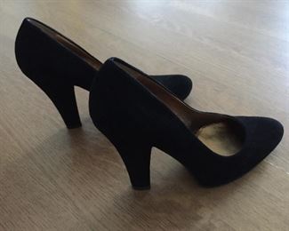 MIU MIU BLACK SUEDE PUMPS: Size: 37. Heel Height: 4.5 inches. Condition: Very good. Shoe runs big for Size 7 so pads were inserted in shoe bottom and around back. Price: $100.