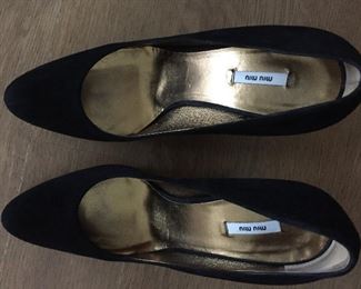 MIU MIU BLACK SUEDE PUMPS: Size: 37. Heel Height: 4.5 inches. Condition: Very good. Shoe runs big for Size 7 so pads were inserted in shoe bottom and around back. Price: $100.