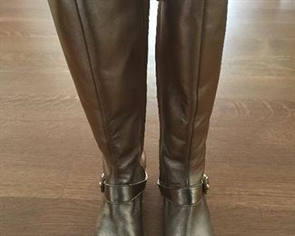 SALVATORE FERRAGAMO METALLIC GOLD-TONE LEATHER KNEE-HIGH BOOTS WITH RHINESTONE/PEARL EMBELLISHMENT: Size 7. Tonal strap accents at ankles. Covered heels and zipper closures at instep. Pink leather interior. Calf circumference: 13 inches. Shaft: 14.5 inches. Heel Height: 1.25 inches. Condition: Good. Faint scuffs and blemishes throughout. Price: $200.