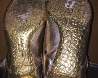 SALVATORE FERRAGAMO METALLIC GOLD-TONE LEATHER KNEE-HIGH BOOTS WITH RHINESTONE/PEARL EMBELLISHMENT: Size 7. Tonal strap accents at ankles. Covered heels and zipper closures at instep. Pink leather interior. Calf circumference: 13 inches. Shaft: 14.5 inches. Heel Height: 1.25 inches. Condition: Good. Faint scuffs and blemishes throughout. Price: $200.