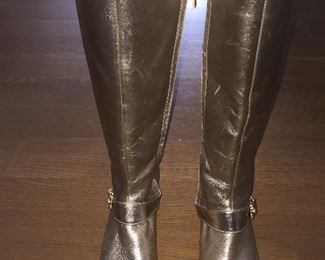 SALVATORE FERRAGAMO METALLIC GOLD-TONE LEATHER KNEE-HIGH BOOTS WITH RHINESTONE/PEARL EMBELLISHMENT: Size 7. Tonal strap accents at ankles. Covered heels and zipper closures at instep. Pink leather interior. Calf circumference: 13 inches. Shaft: 14.5 inches. Heel Height: 1.25 inches. Condition: Good. Faint scuffs and blemishes throughout. Price: $200.