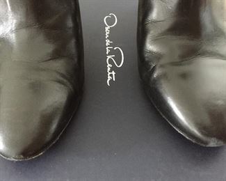 OSCAR DE LA RENTA BLACK LEATHER ANKLE BOOTS: Size 8 or 38.. Round-toe ankle boots with black matte and metal tone ombre block heels. Size 8 or 38. Heel Height: 3.5 inches. Condition: Good. Light scratches on toe, body and heels. Retail value: $890. Price: $200.
