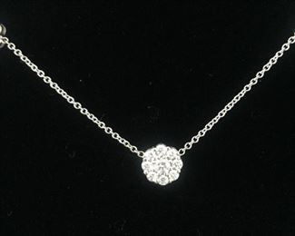 DIAMOND FLEURETTE 18 KT WHITE GOLD AND 1.64 CARAT DIAMOND NECKLACE: LOTS OF FIRE AND SPARKLE.
Signed appraisal report included. Gift Box Included.
One stamped and tested 18KT white gold lady's hand assembled three diamond cluster necklace with a shared prong set.
18KT white gold lobster clasp and bright polish finish.
Identified with markings of "18kt/750".
Condition: Excellent. Light scratches on metal.
Total Weight of Diamonds: 1.64 ct.
Total Weight of Three Diamond Cluster Necklace: 6.00 gm.
Three shared prong set round brilliant cut diamonds exact total weight of 3 stones = 0.52 ct.
Clarity: VS. Color: F. Cut: Excellent
Twenty-four shared prong set round brilliant cut diamonds exact total weight 24 stones = 1.12ct.
Clarity VS. Color: F-G. Cut: Excellent.
Price: $2,900
