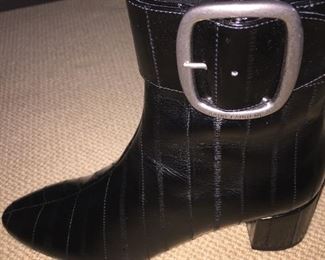 YVES ST. LAURENT BLACK EEL SKIN ANKLE BOOTS: Size 7.5. Condition: New. Excellent. Price: $200.