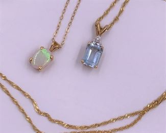 Gold necklaces with opal and gemstones