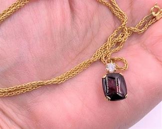 14K gold chain with garnet cabochon and nice sized genuine diamond pendant