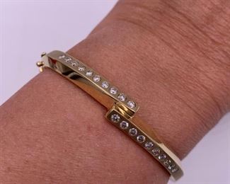 14K and diamond bangle bracelet - approximately 1 carat of diamonds