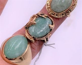 Three jade rings - all 14K gold.