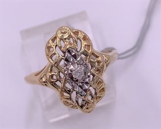 14K gold with small diamond center