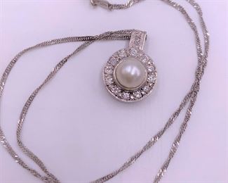 14K white gold, diamonds and pearl pendant