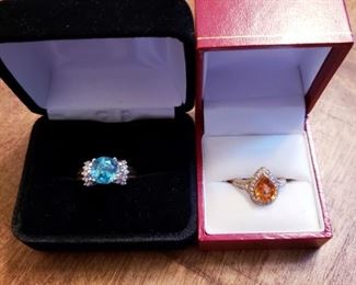 14k Yellow / White Gold Blue Zircon and Diamond Ring      18k Yellow Gold Mandarin Garnet Diamond Ring                              