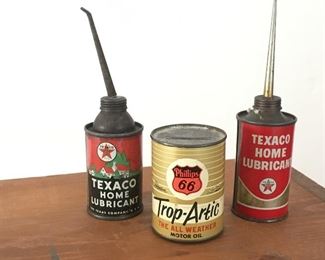 ADVERTISING OIL CANS