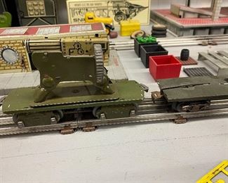 A FEW PIECES OF A LARGE SELECTION OF MARX MILITARY TRAINS