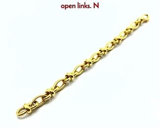 Lot 83 18K Heavy chain link bracelet. Decorative open links. N