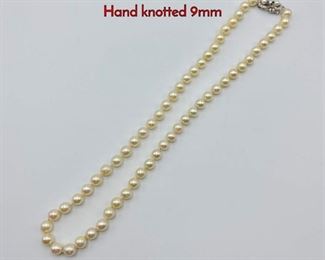 Lot 102 14K Gold Diamond Clasp Pearl Necklace. Hand knotted 9mm