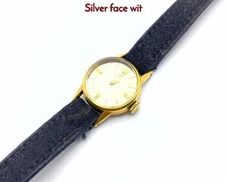 Lot 106 Gold Vintage MOVADO Ladies Wrist Watch. Silver face wit