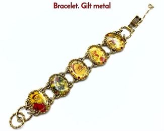 Lot 154 MAXIMAL ART by JOHN WIND Christmas Bracelet. Gilt metal