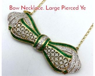 Lot 48 18K Gold Diamond Emerald Bow Necklace. Large Pierced Ye